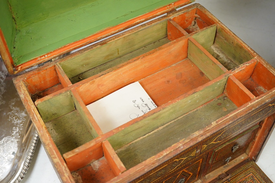 A 19th century Shiraz Eastern inlaid table cabinet, 36cm wide, 32cm high. Condition - damage to front corner edge of stringing, one side has small crack and top stringing one side missing.